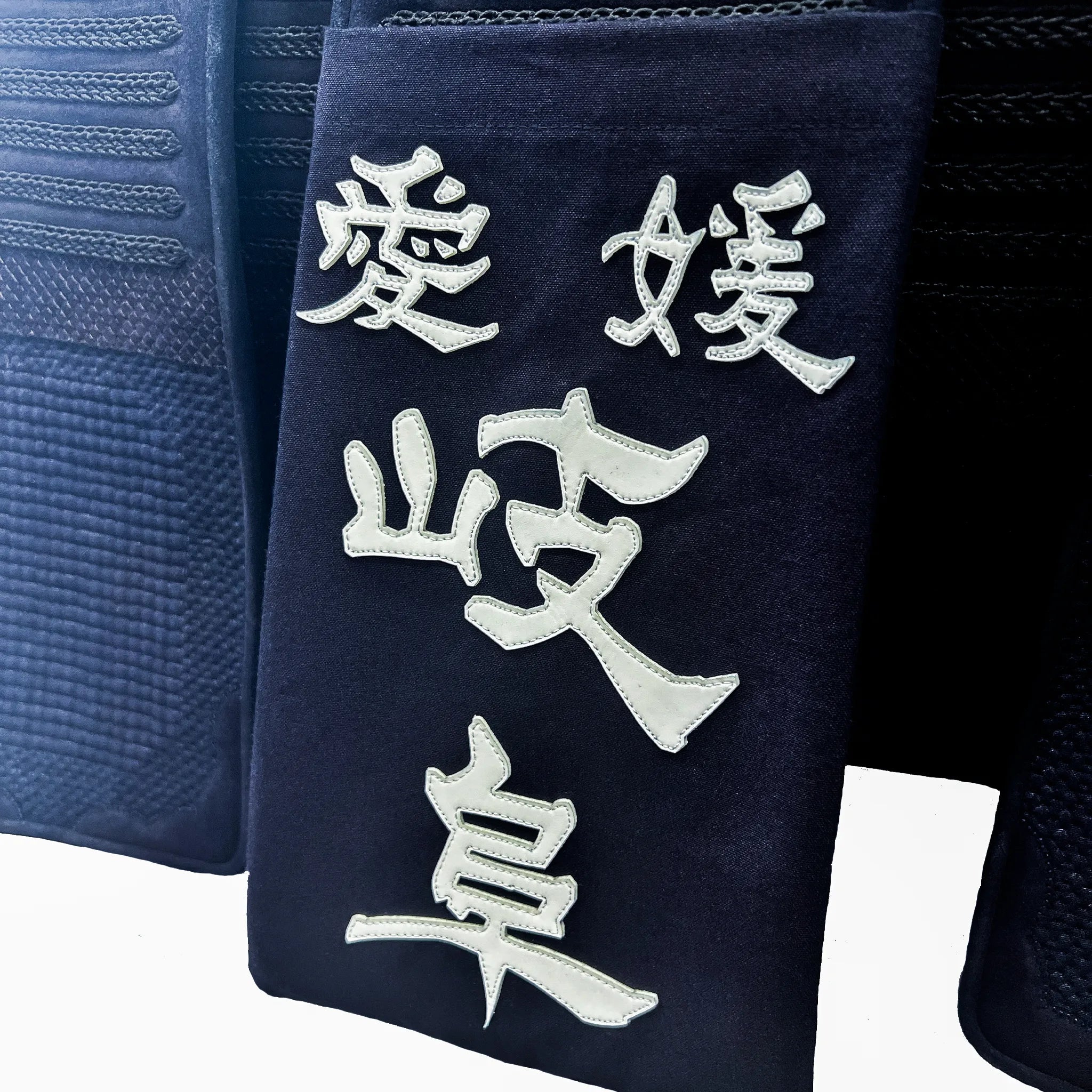 帯に付けられた名札