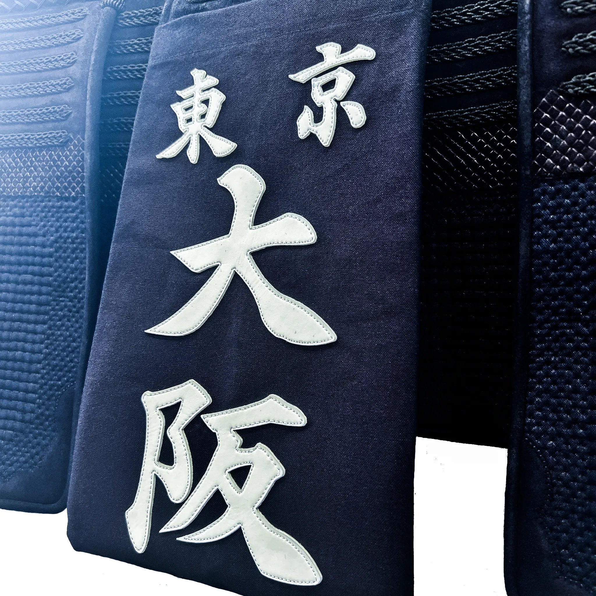 帯に付けられた名札