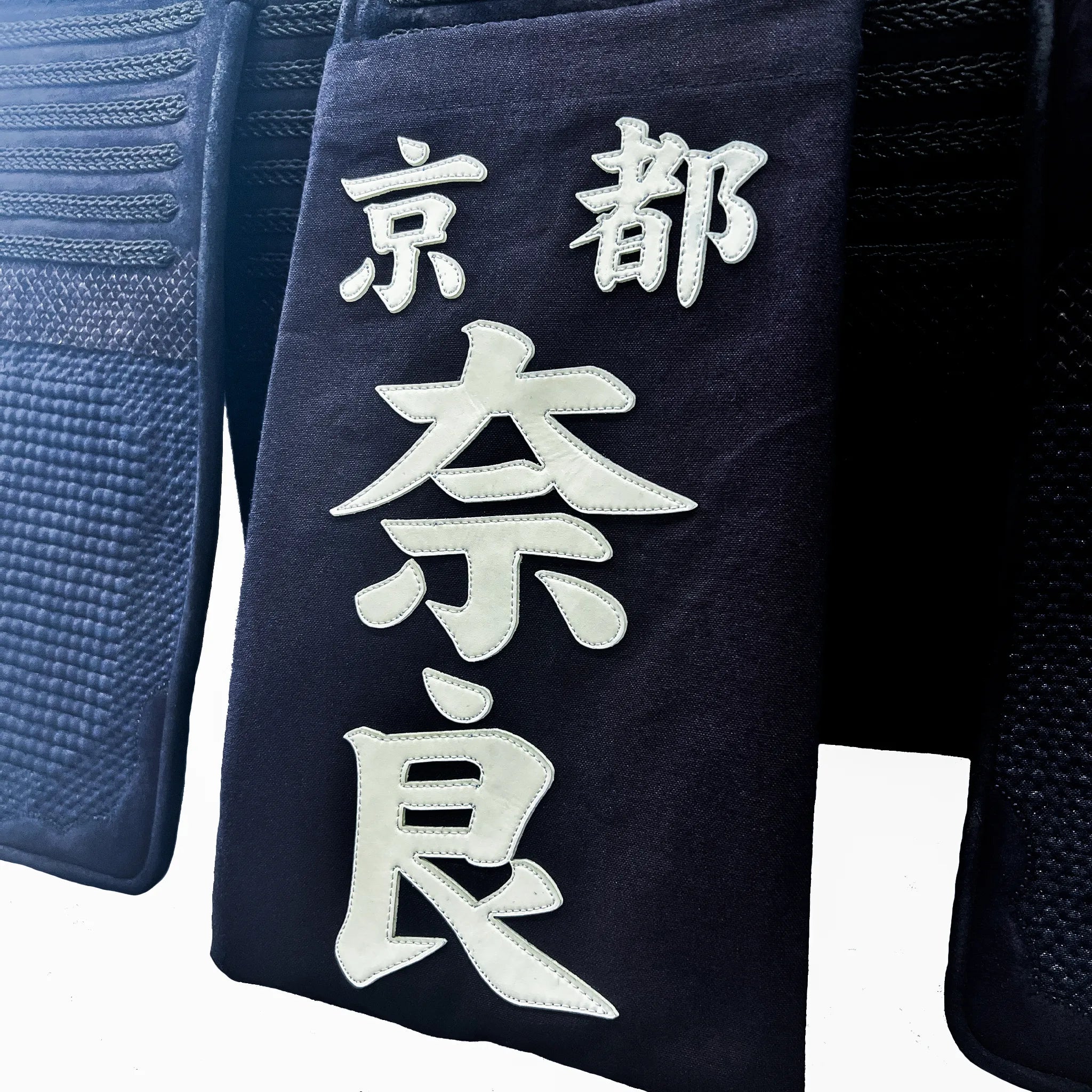 帯に付けられた名札